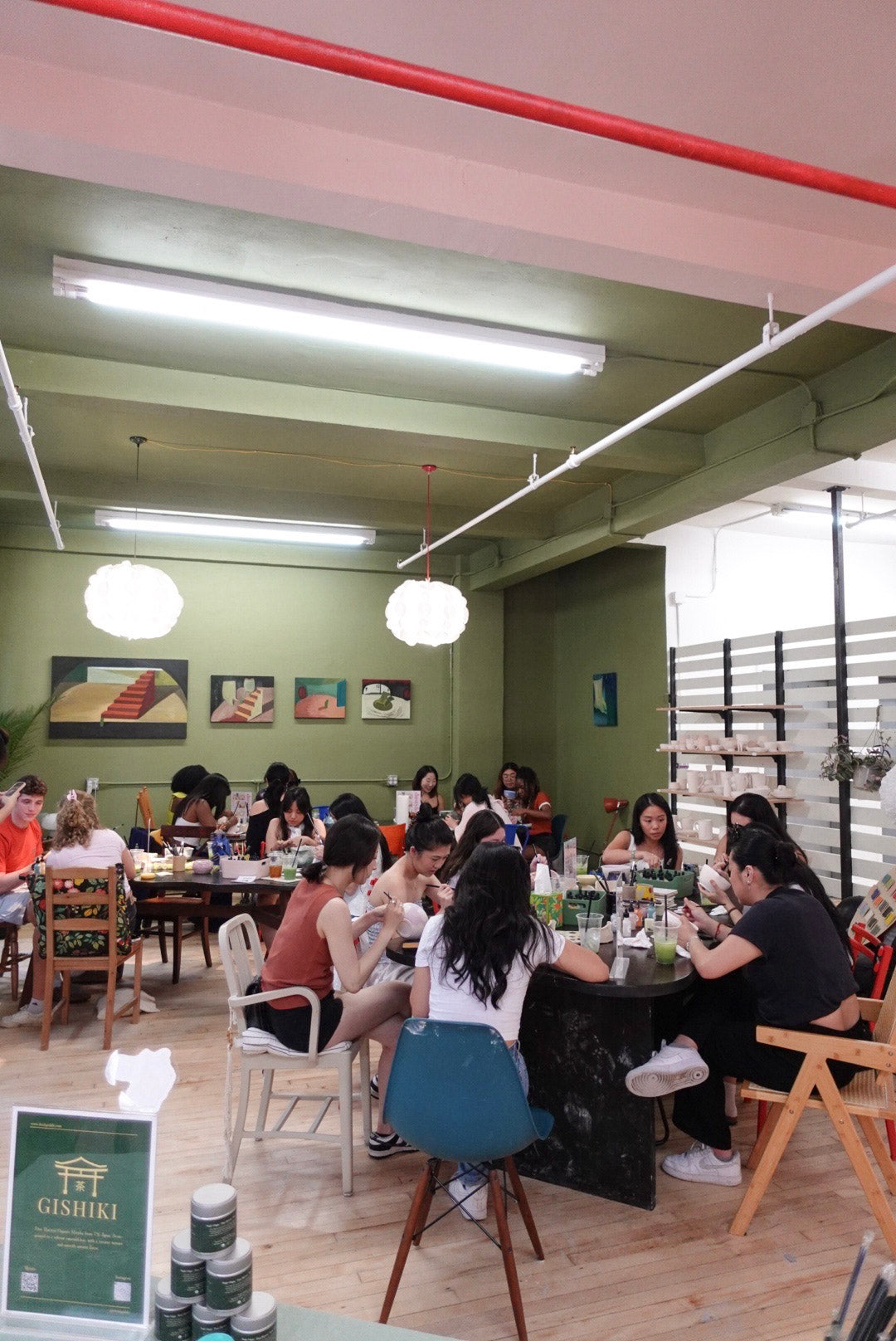 Guests painting matcha bowls at Dusty & Co. with Gishiki